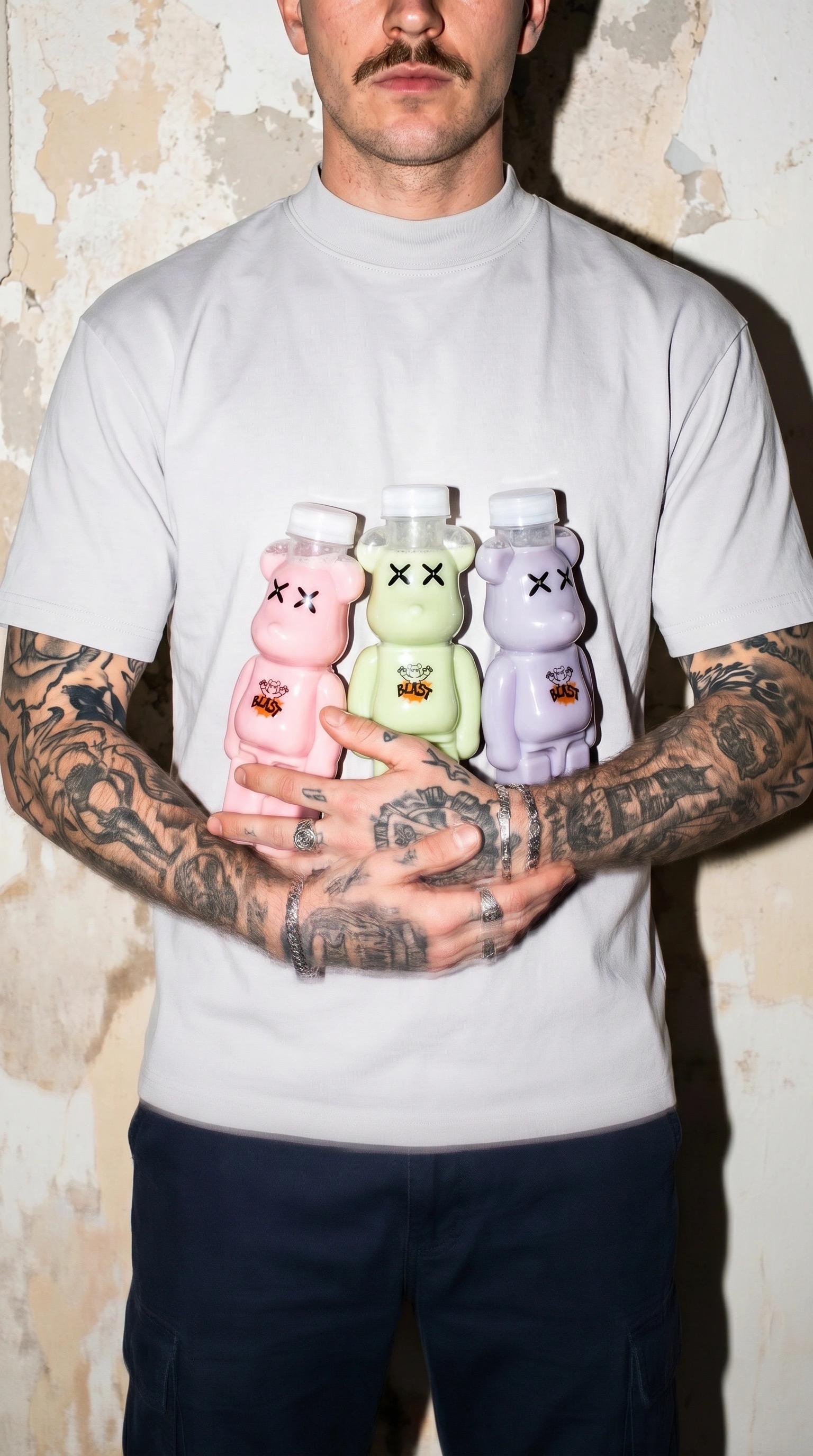 Stockist holding three Blast drinks