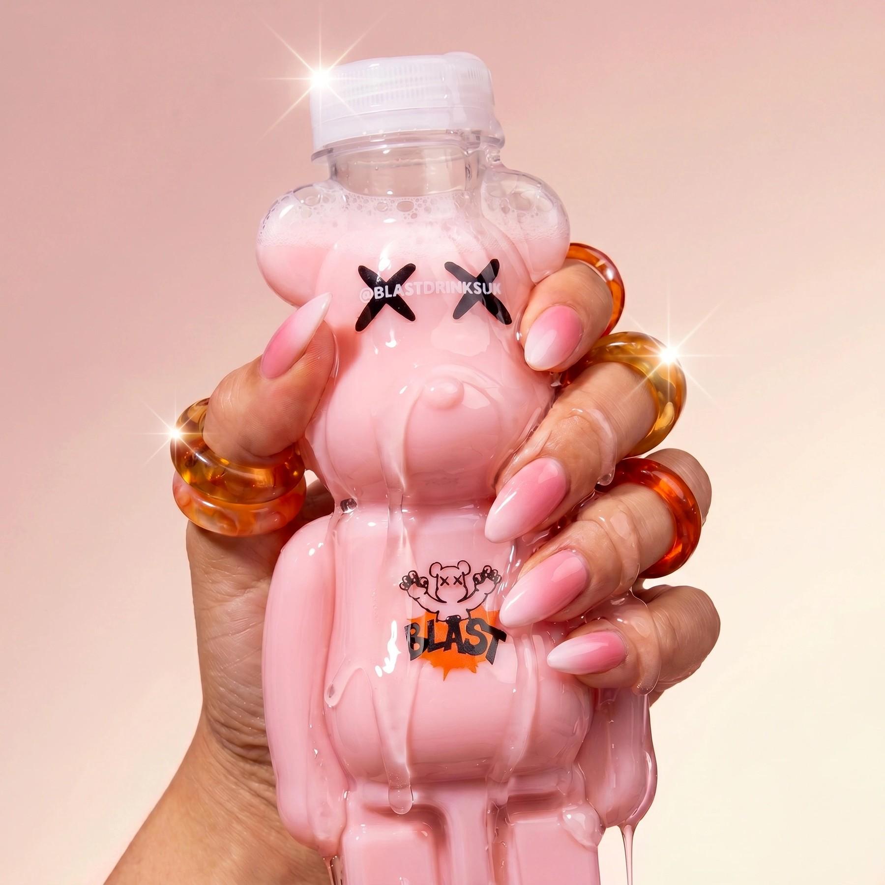 Pink Blast character drink held in hand